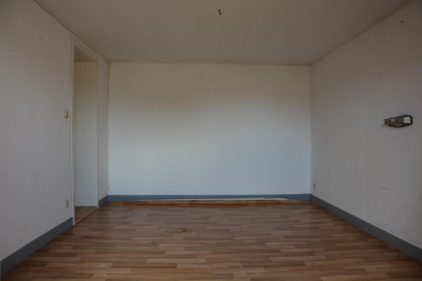 Op te knappen woning in rustige straat 