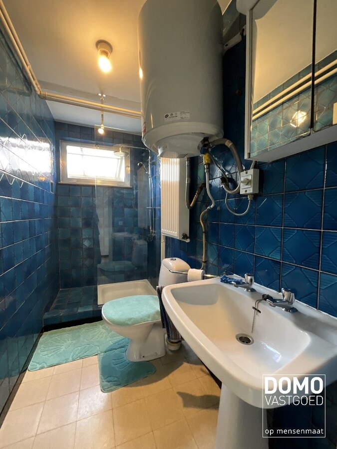 WONING MET GARAGE EN 1 SLAAPKAMER TE KERMT 