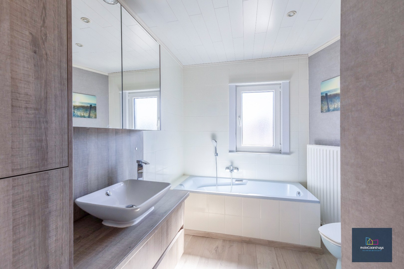 Goed onderhouden en ruime woning in rij met tuin/terras te Wondelgem 