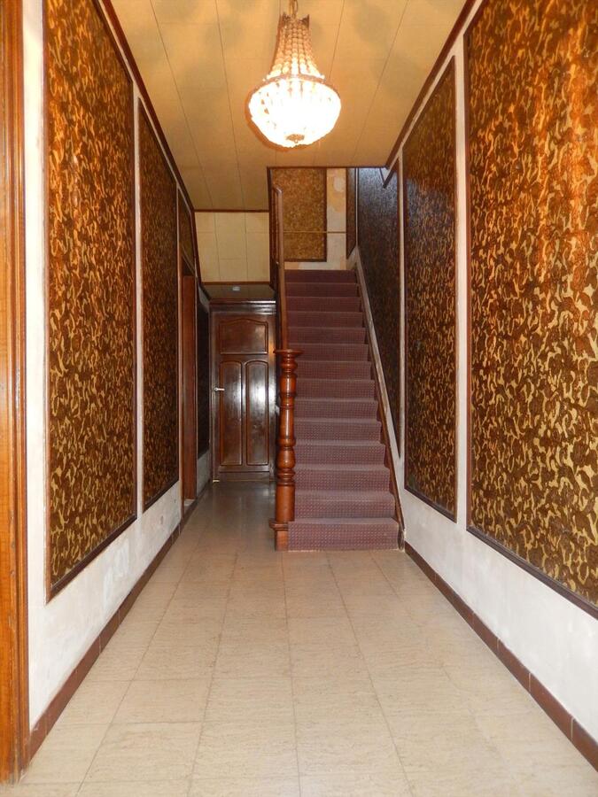 Ruime woning met grote opslagplaats/loods en zonnige tuin 