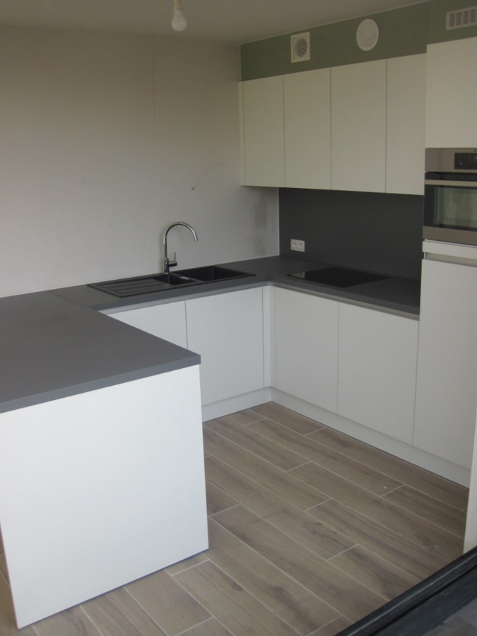 Aangename, energiezuinige nieuwbouwduplex in hartje Deinze 