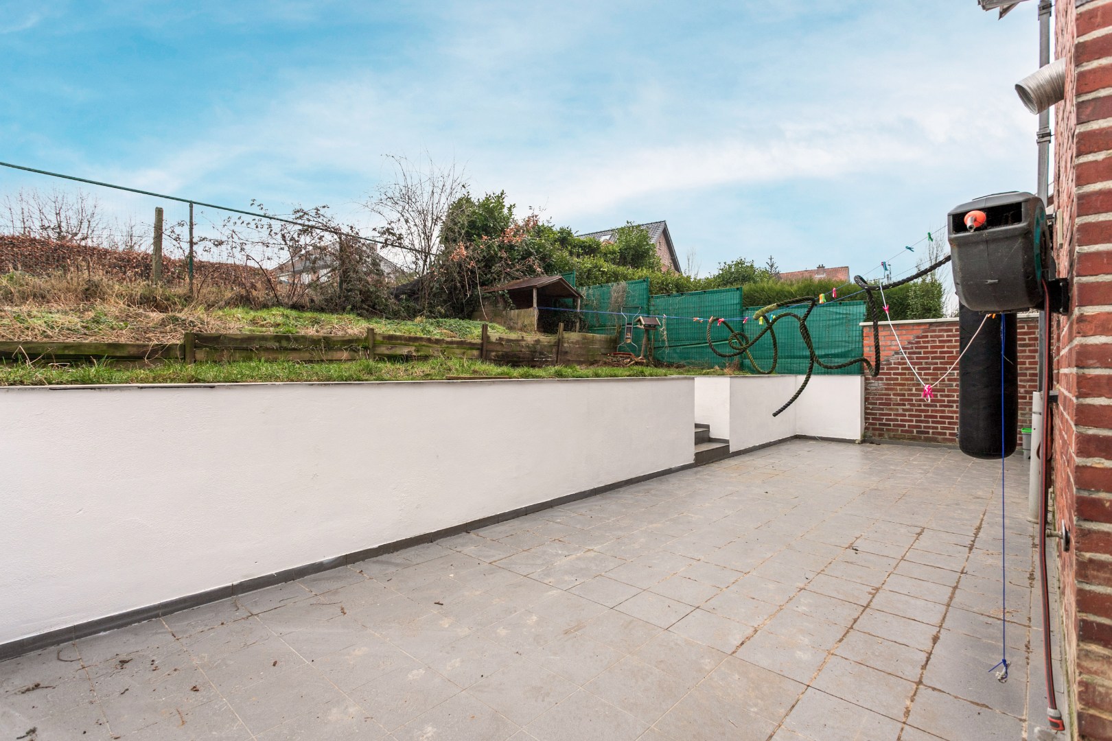 Solide woning met 3 slpks, tuin en garage te Buizingen 