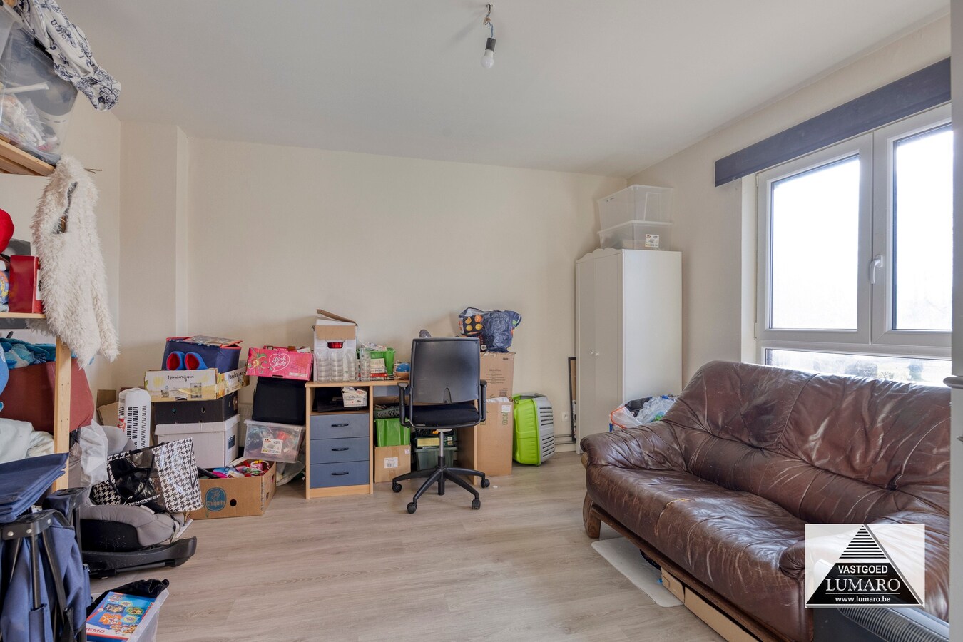 Ideale praktijk- of kangoeroewoning met tuintje en parking 