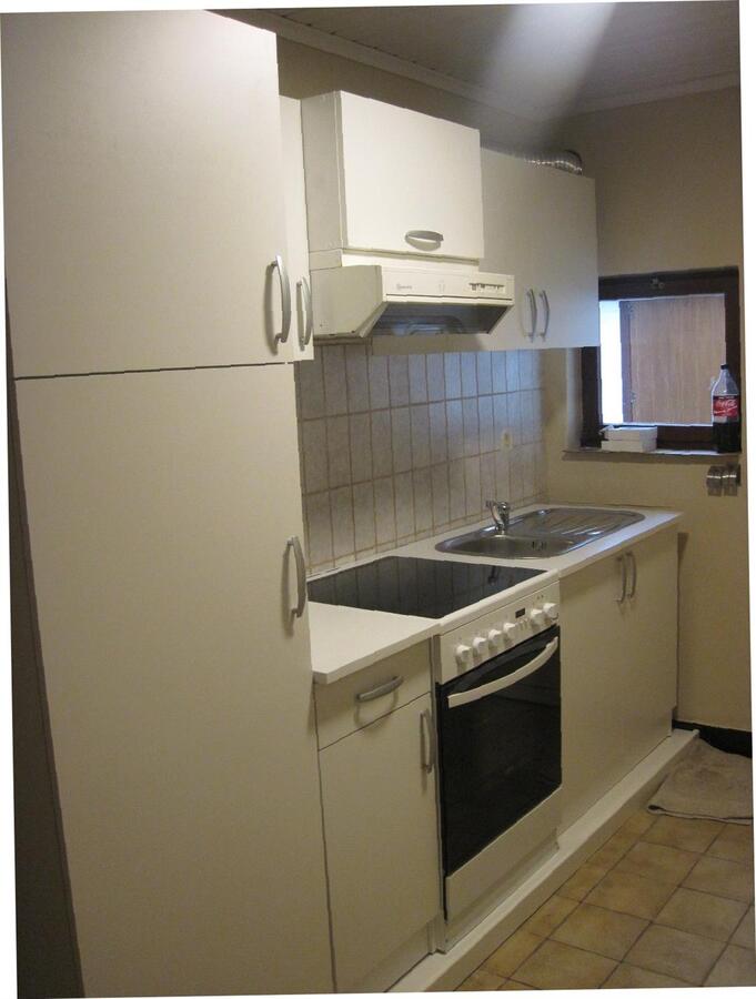 Verzorgde, authentieke rijwoning in hartje Asper. 