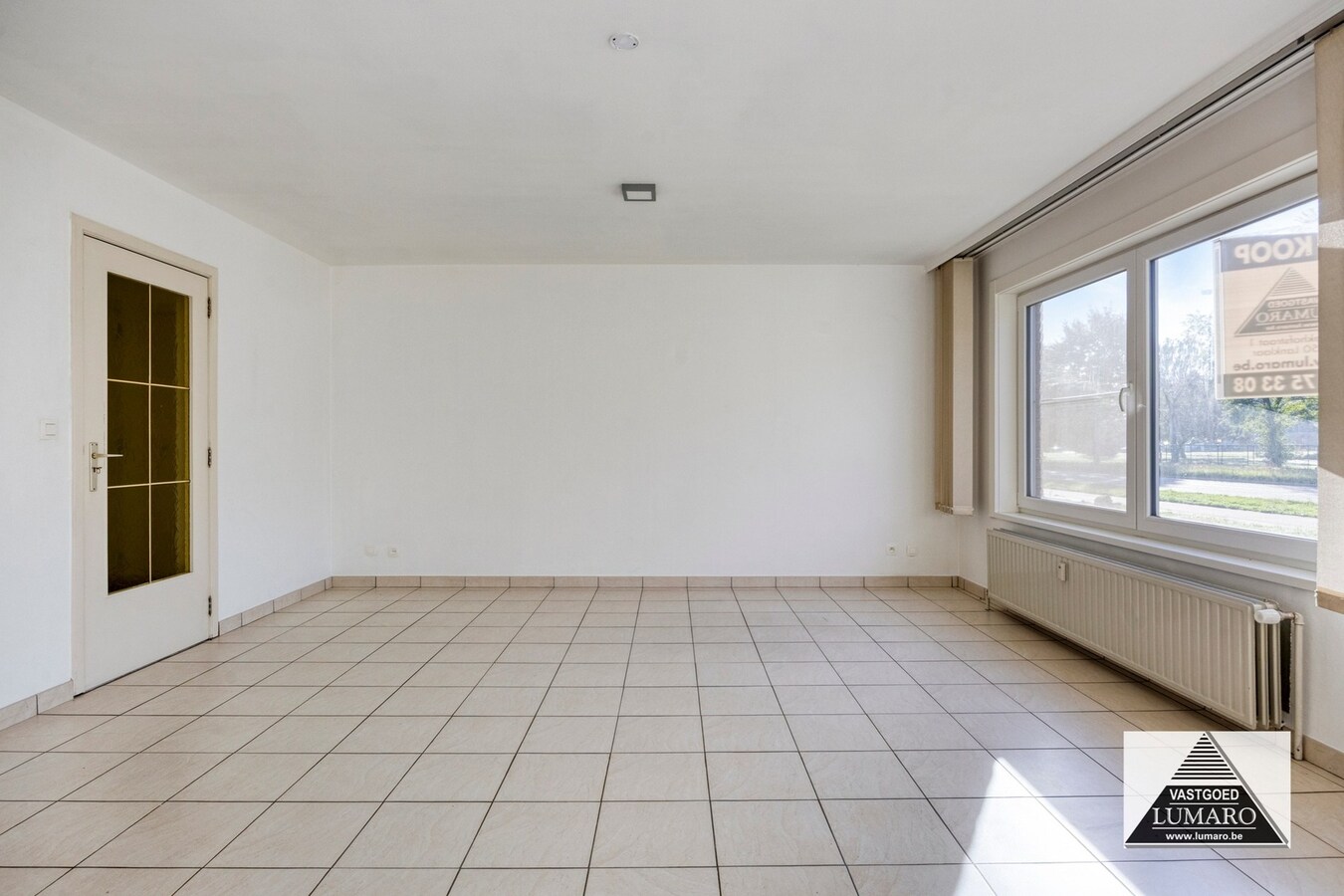 Gelijkvloers appartement met 3 slaapkamers, en ruime garage 