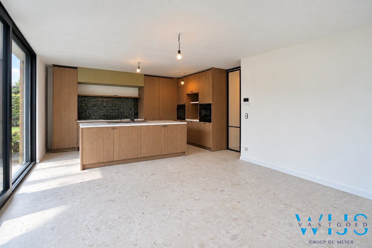 High-end gelijkvloers appartement met tuin te Lembeke ! 