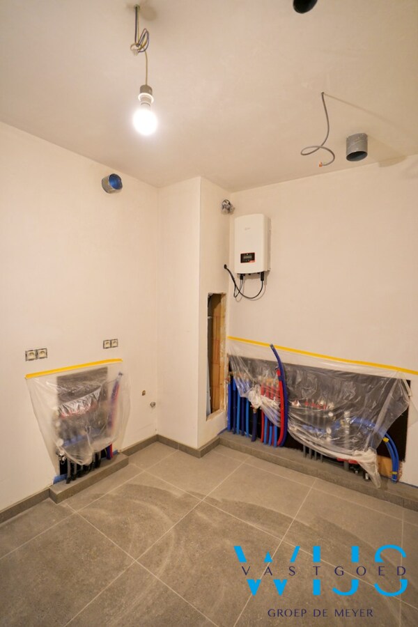 Drieslaapkamer appartement met garage in hartje Ertvelde ! 