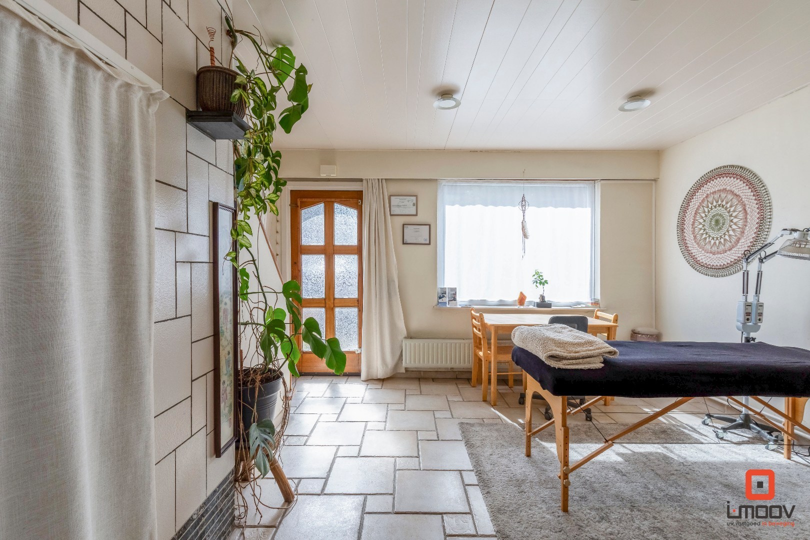 Karaktervolle tuinwijkwoning met unieke architectuur en garage te Gentbrugge 