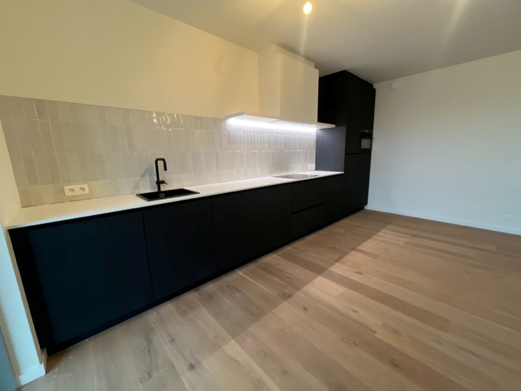 OPENDEURDAG: Project Hoost Zondag 12/04 - 10u - 14u (Maes en Boerenboomplein): Centraal gelegen 2-kamer appartement te Project Hoost met XL-terras 