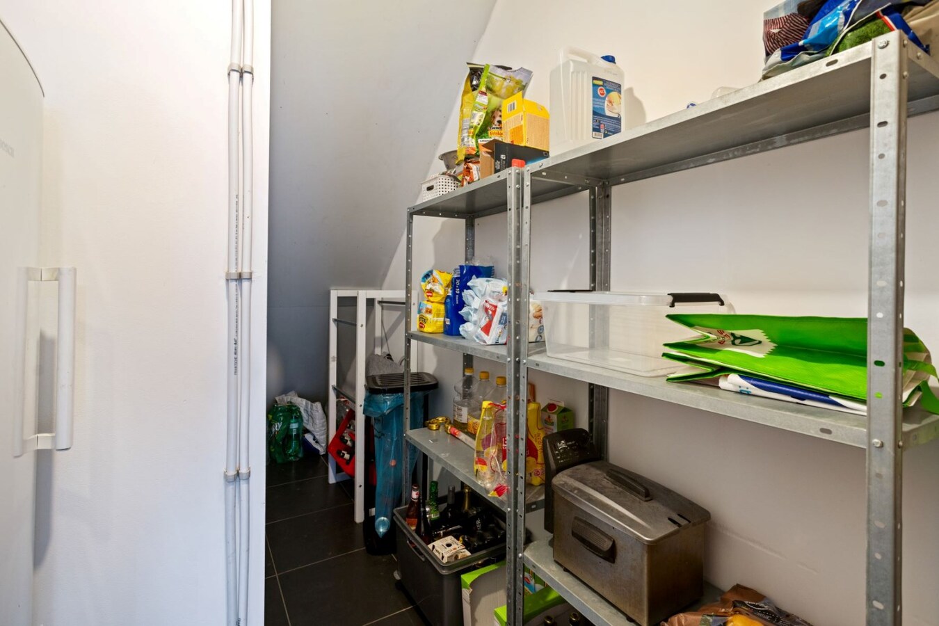 Centraal gelegen, halfopen woning met zonnige tuin 