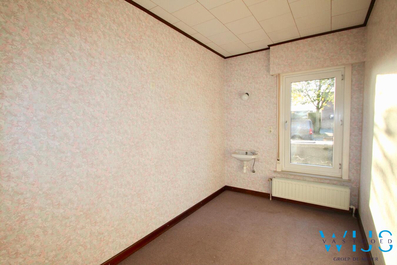 Charmante open bebouwing gelegen in gezellige wijk te Evergem! 