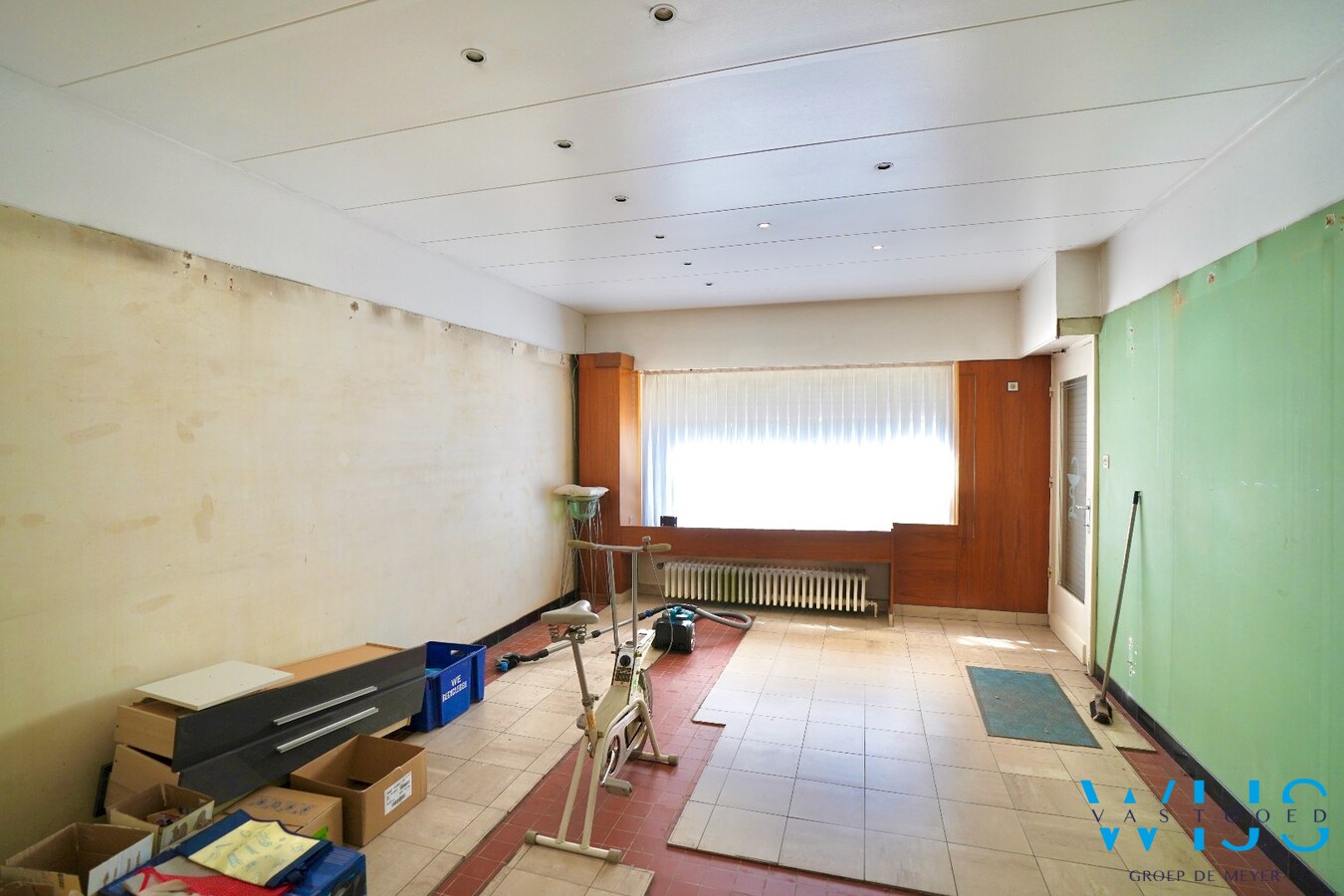 Karaktervolle en instapklare woning met uitzonderlijk perceel van 1.445 m² in hartje Ertvelde 