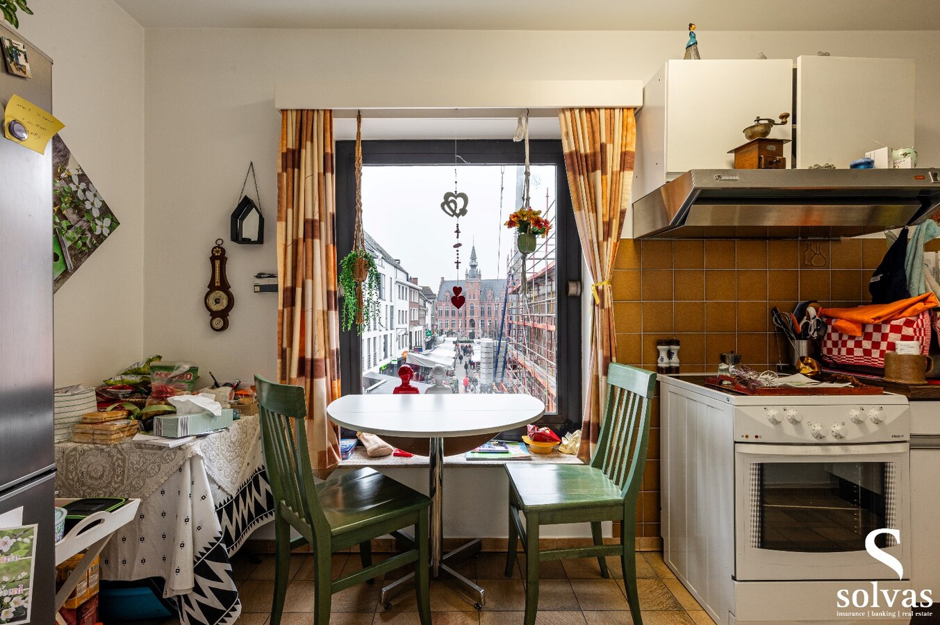 Gebouw met 4 appartementen en 2 handelspanden in centrum Maldegem 