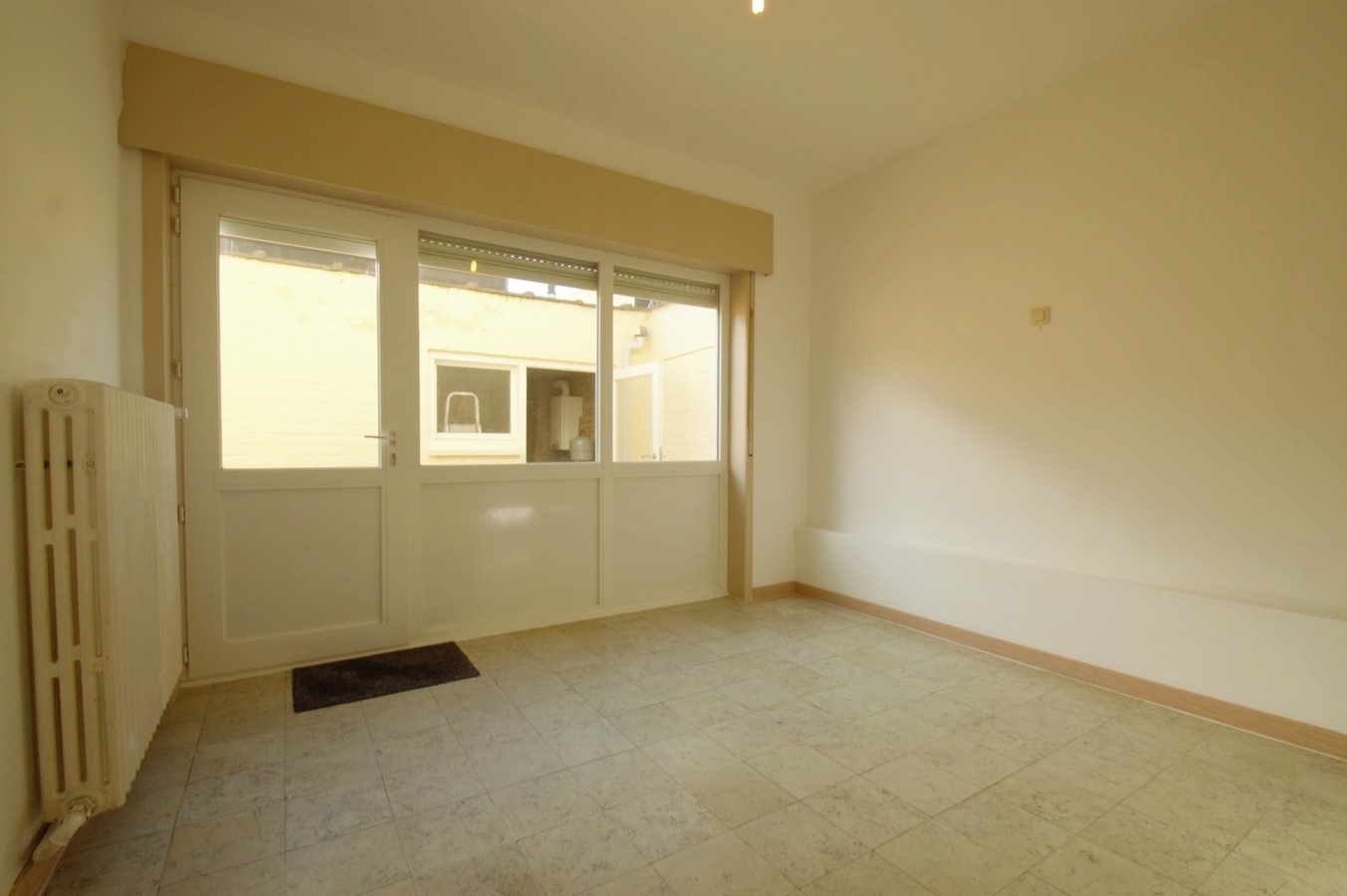 Gelijkvloers appartement met terras en garage - Heist 