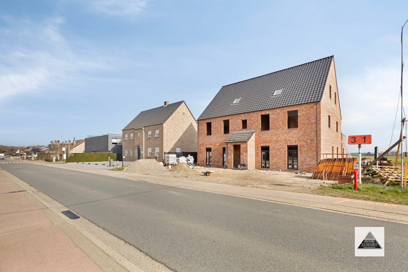 Nieuw gelijkvloers appartement met terras en tuintje 