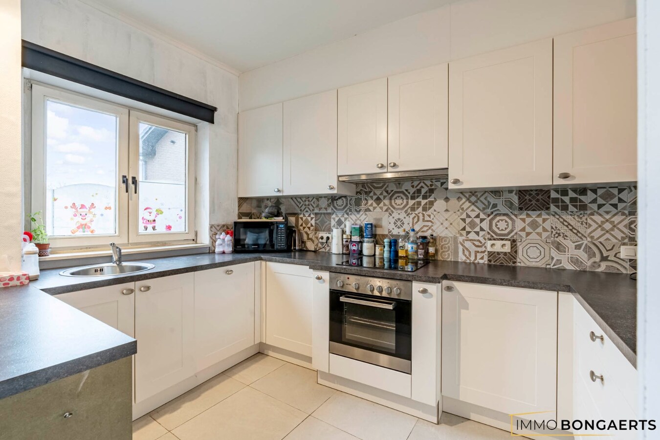 Instapklare woning met  garage en twee slaapkamers in Maasmechelen 