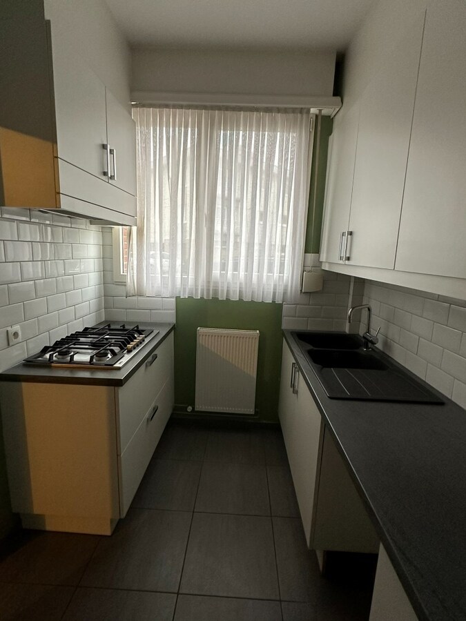 Gelijkvloersppartement met 3 slpk, dubbele garage, tuin en ruime kelder (120 m²) 