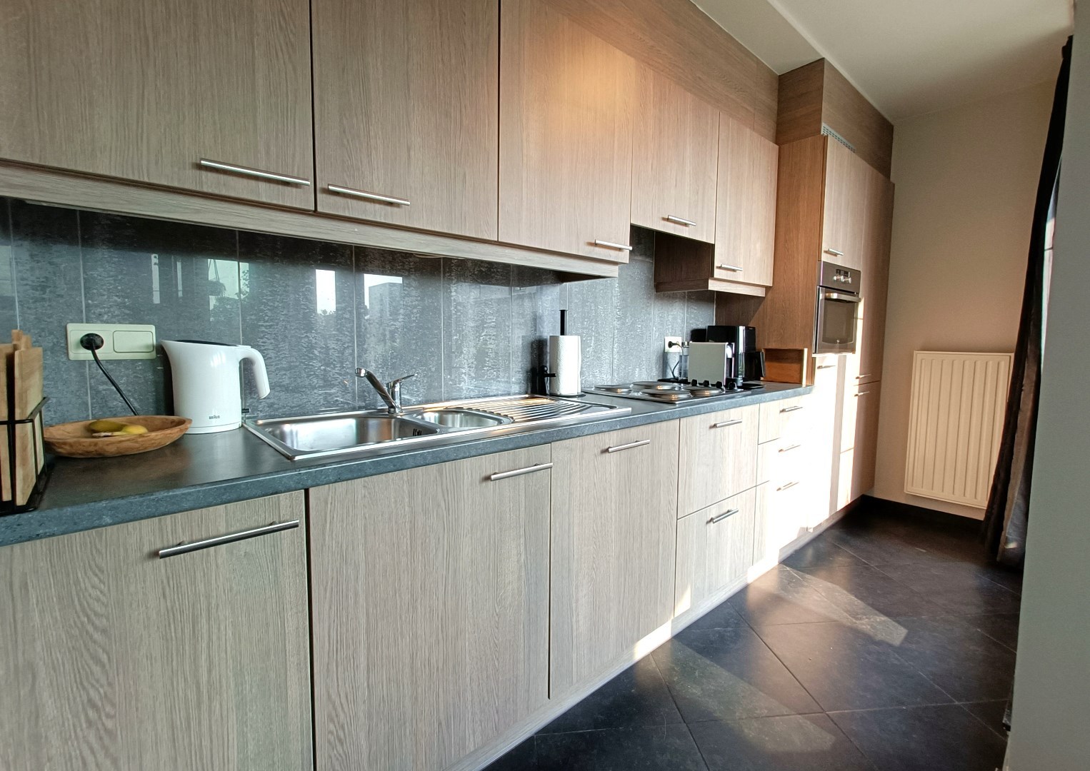 APPARTEMENT MET TERRAS EN AUTOSTAANPLAATS 