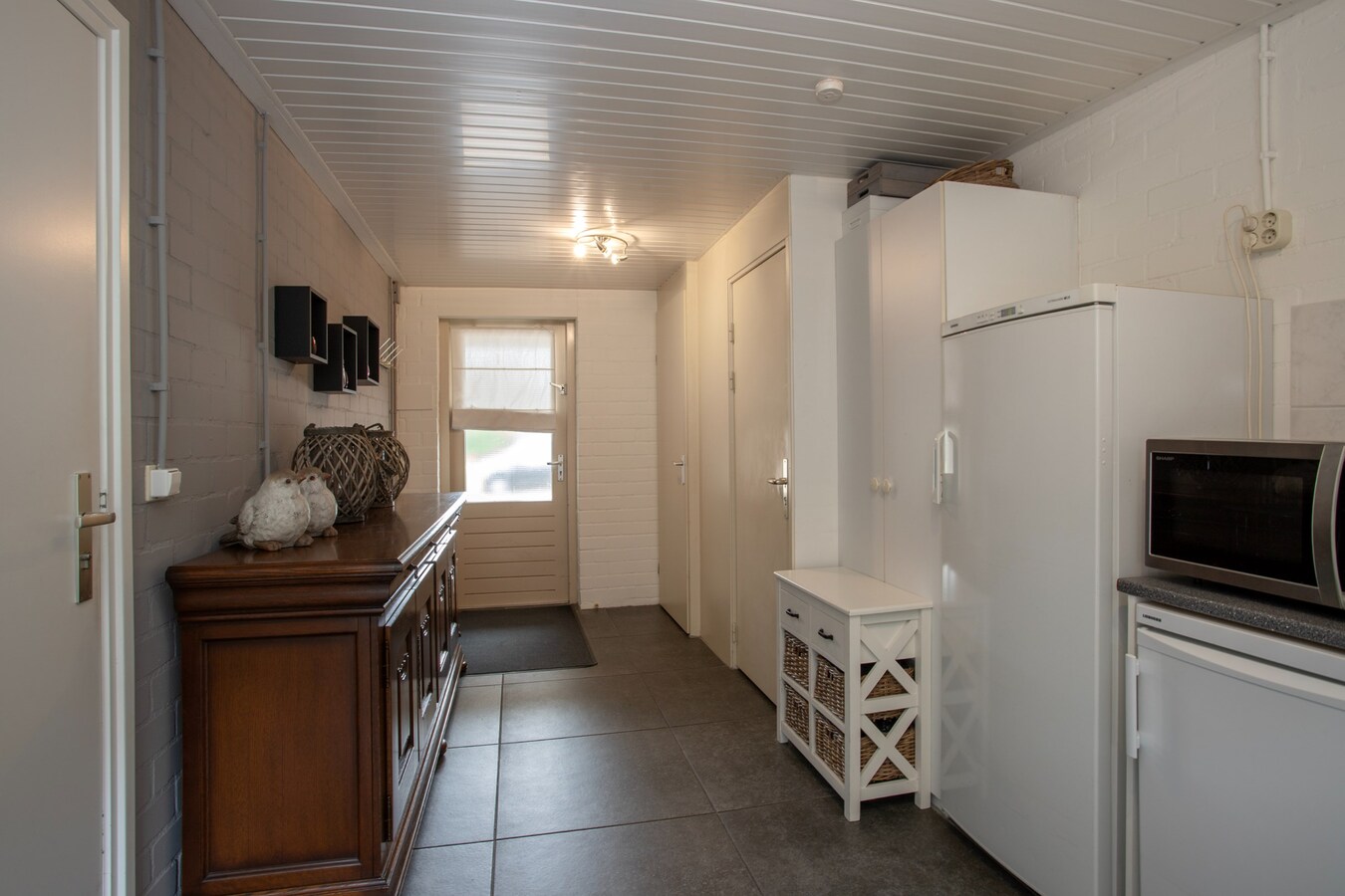 Royale gemoderniseerde gezinswoning met grote woonkamer, open keuken en vijf slaapkamers in hartje Middelbeers 