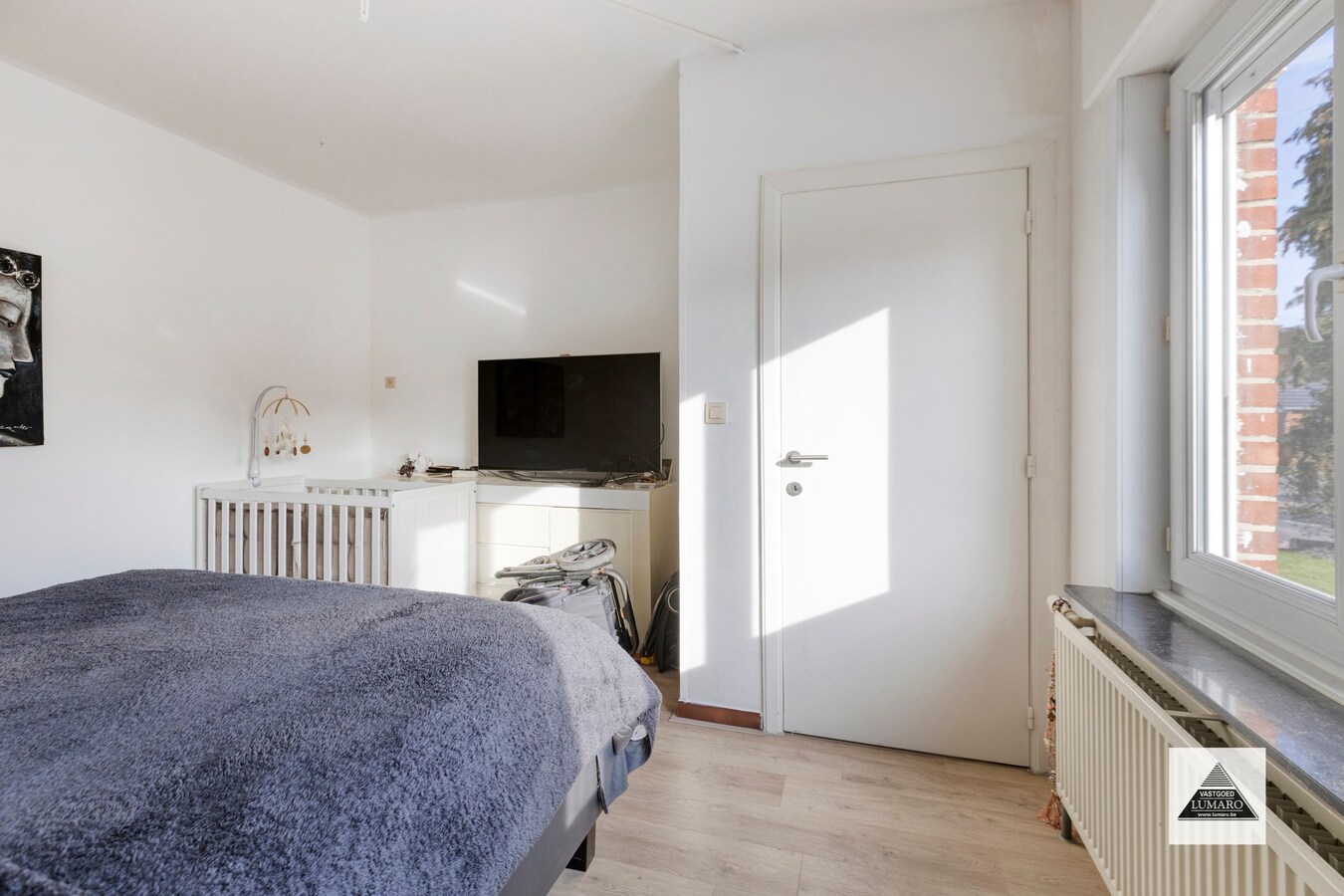 Gelijkvloers appartement met tuintje en parking 