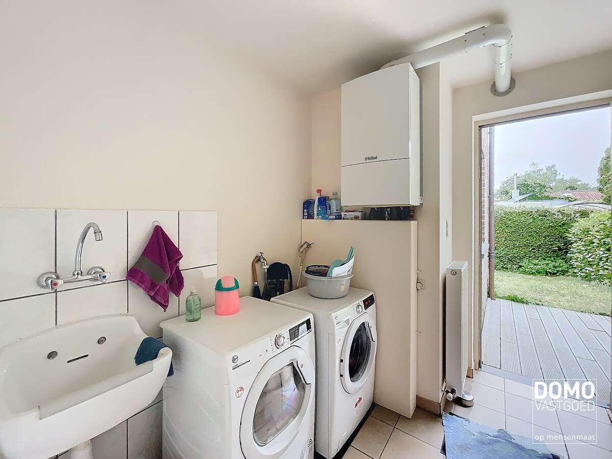 GELIJKVLOERS APPARTEMENT MET TUIN EN GARAGEBOX GELEGEN TE TUILT  (KURINGEN) 