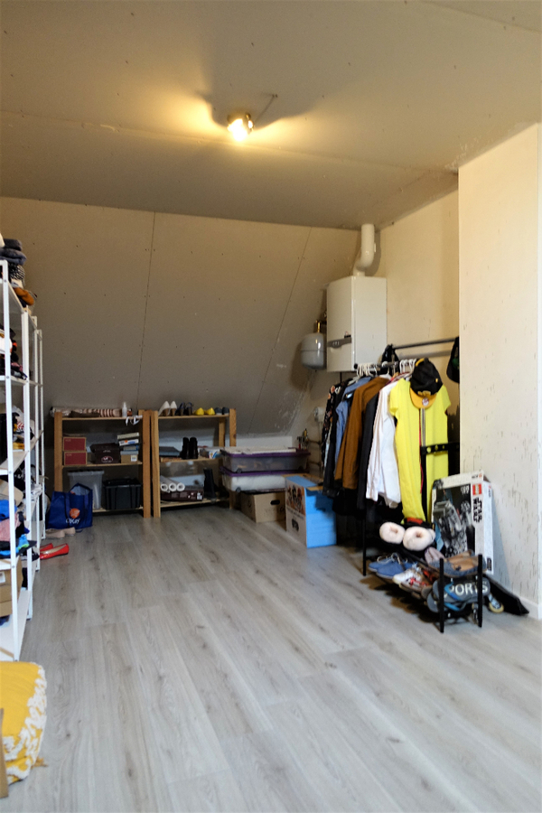 Gezellige woning met garage en zuidgerichte tuin 