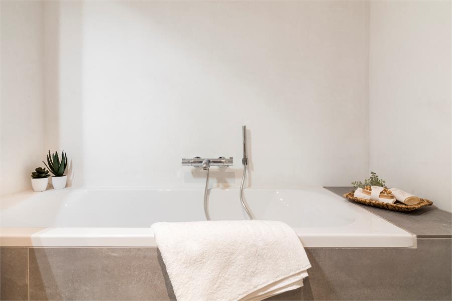 Nieuwbouwwoning met hoogwaardige afwerkingsgraad op centrale ligging 