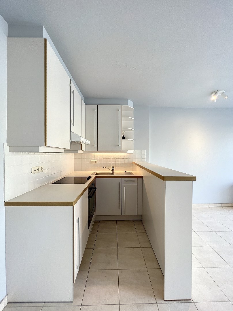 Appartement prêt à emménager avec 1 chambre et terrasse dans un quartier résidentiel calme. 