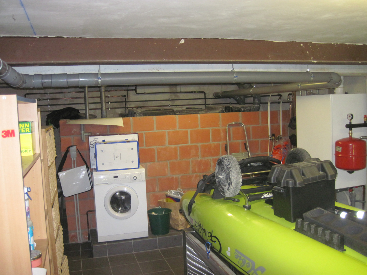 Recent vernieuwde rijwoning nabij de Schelde. 