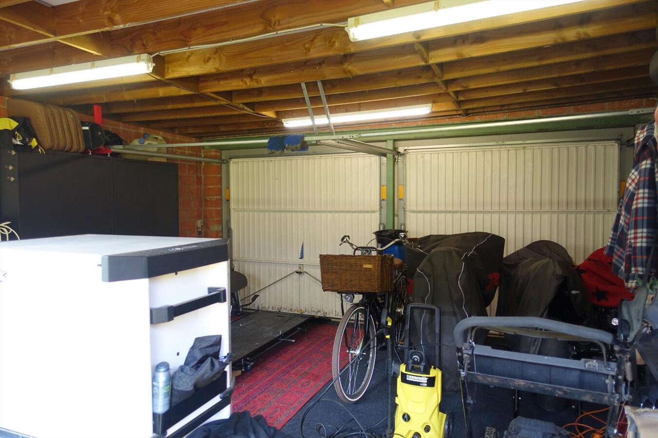 Gezellige rijwoning met tuin en een dubbele garage 