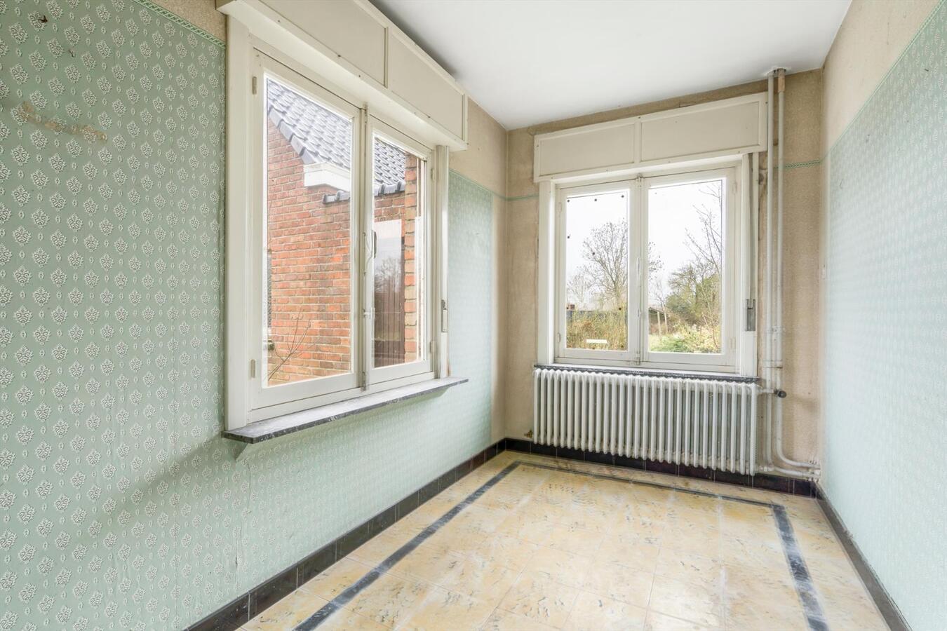 Rustige gelegen open bebouwing met bouwgrond op 1780 m² te Koekelare 