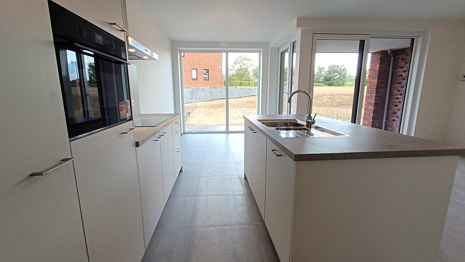Nieuwbouwappartement met tuin en terras 