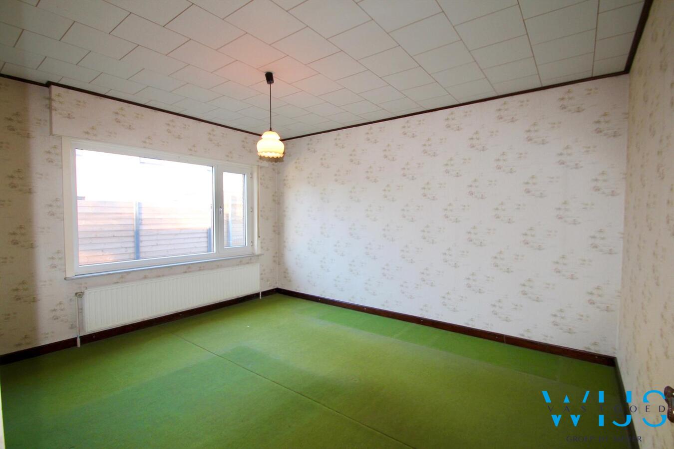 Charmante open bebouwing gelegen in gezellige wijk te Evergem! 