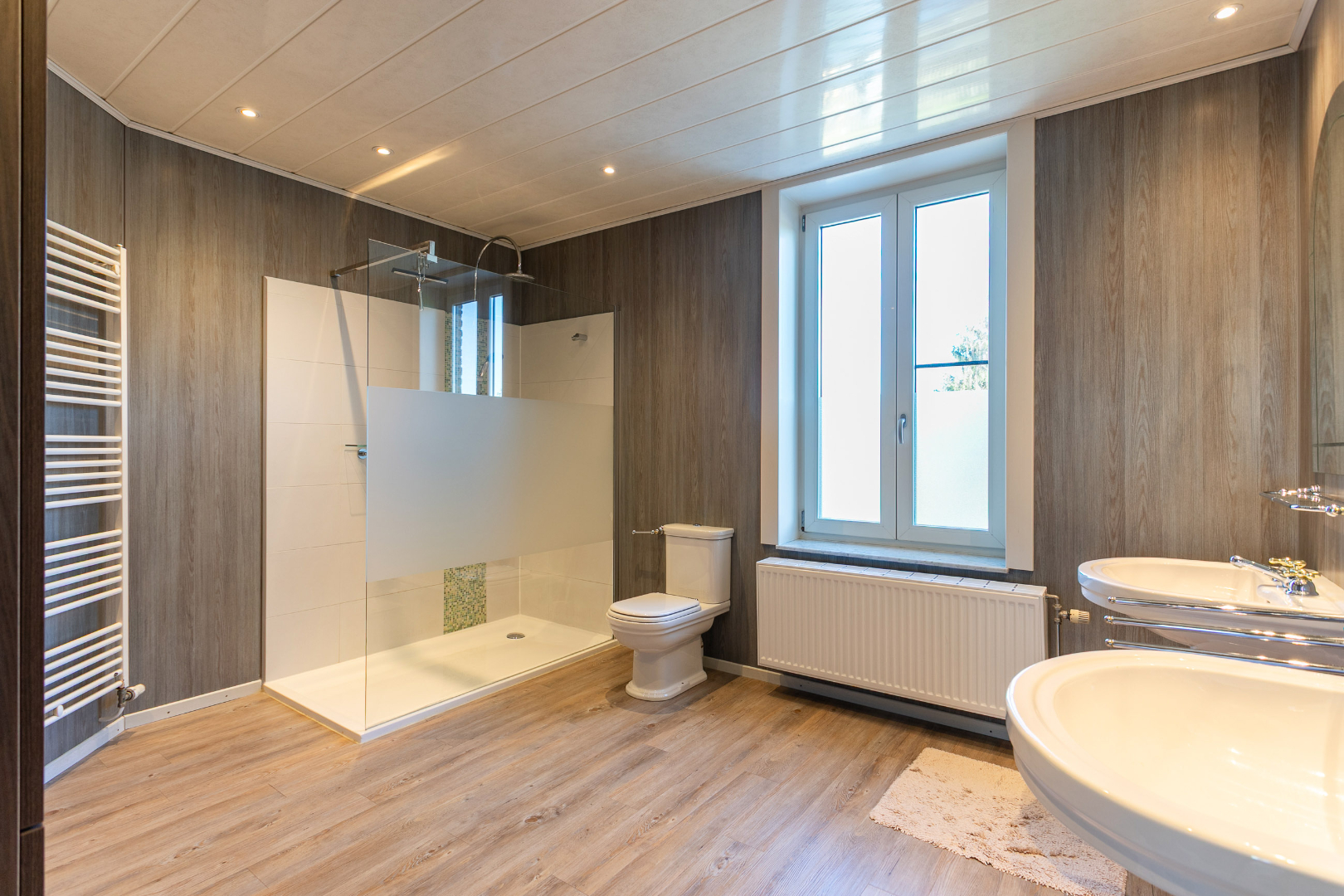Instapklare driegevelwoning met 4 slpk te Lembeek 