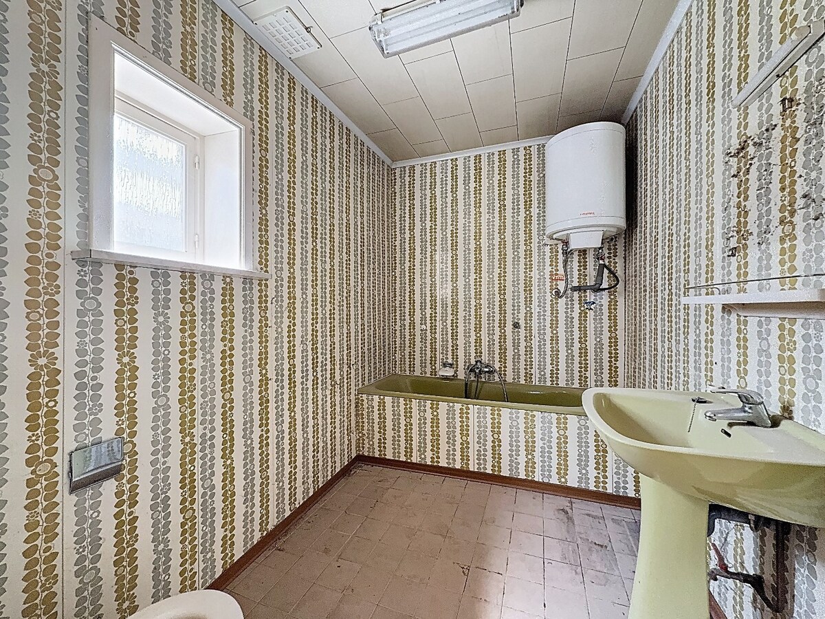 Leuk renovatieproject op gunstige locatie te Oosterzele 