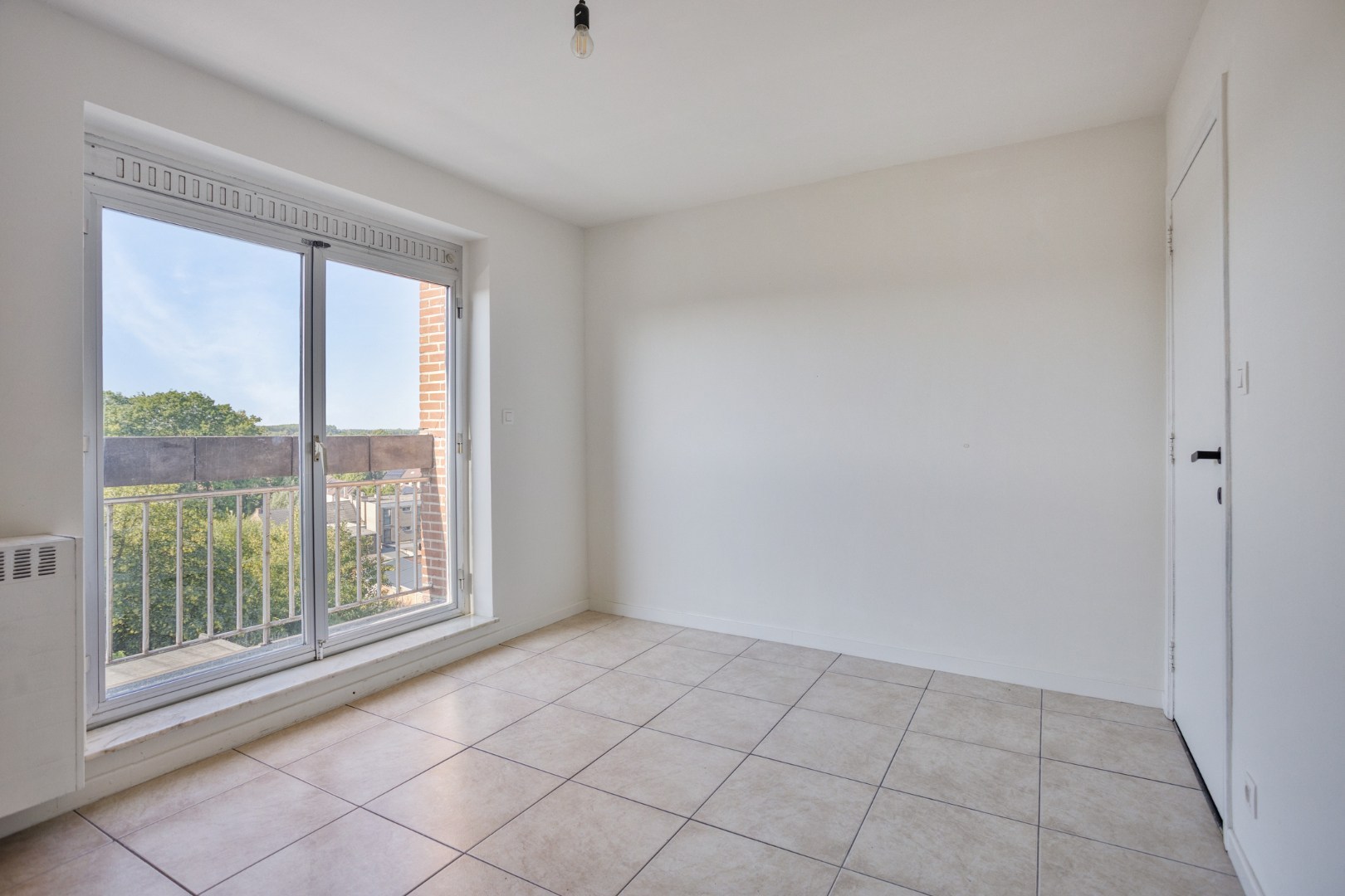 Slaapkamer 1 met balkon