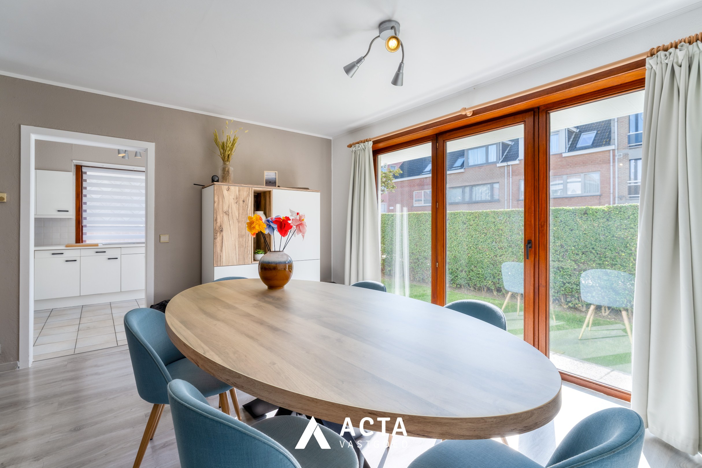Gelijkvloers 3-slpk-appartement+tuin in Mariakerke 