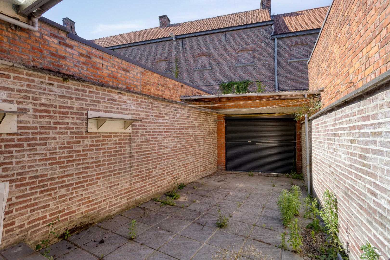 Centraal gelegen rijwoning in Kessel-Lo met parking - EPC 246 kwh/m² 