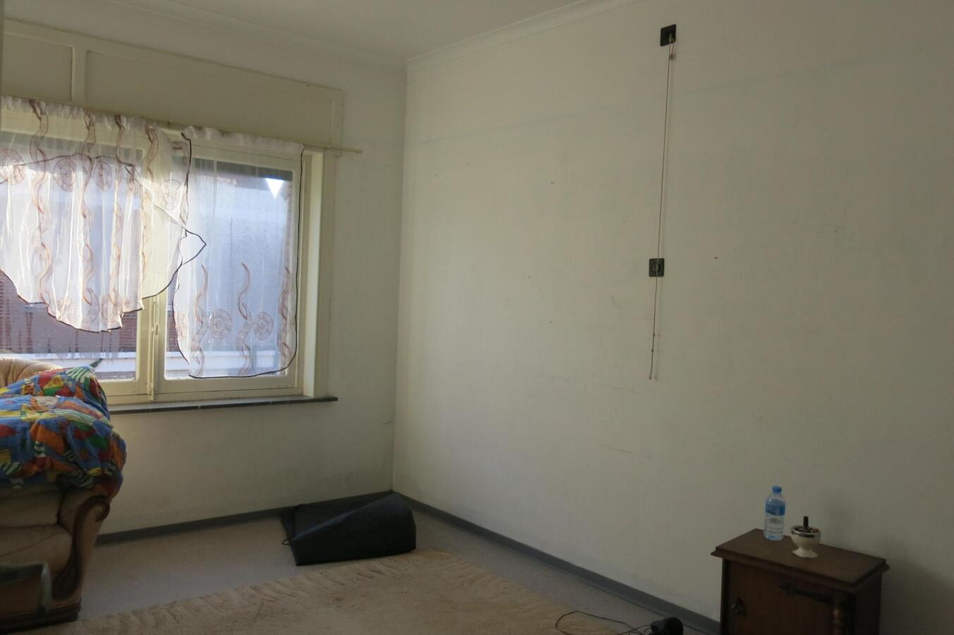 Degelijke ruime woning met garage en tuin op 390m² 