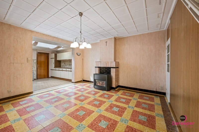 Te renoveren rijwoning op centrale ligging met leuke zuidgerichte tuin 