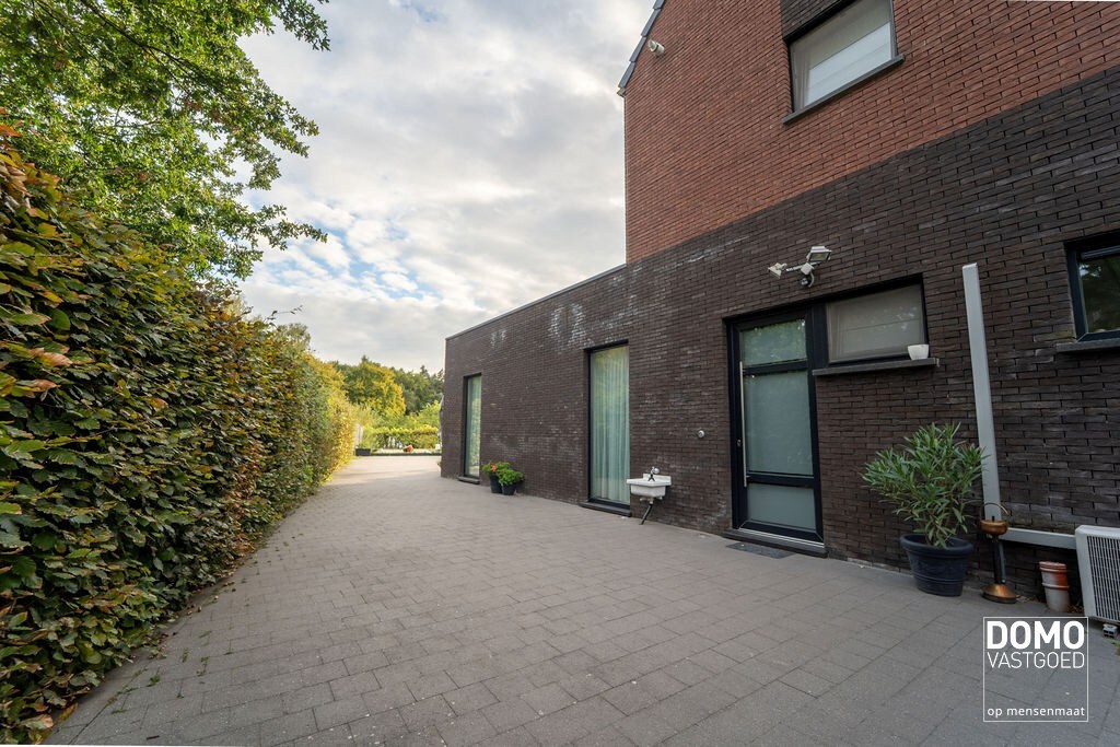 Gunstig gelegen handelshuis te Spalbeek (Hasselt) 