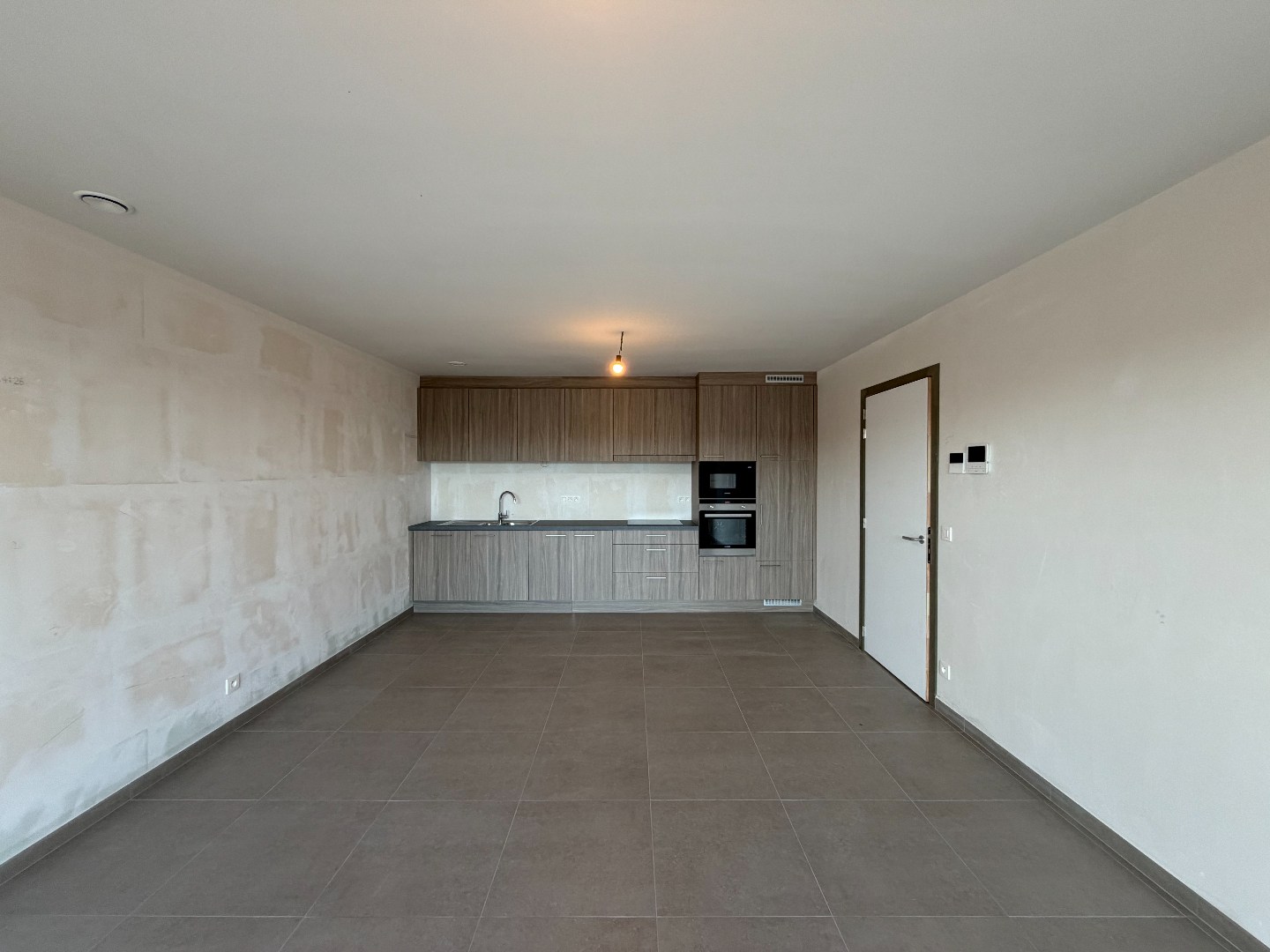 Nieuwbouwappartement met garage 