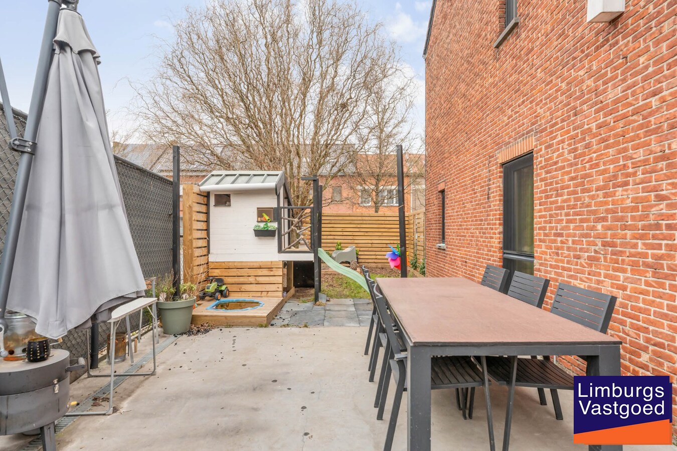 Stadswoning met 4 slpk, zuidgerichte tuin en garage, nabij kleine ring, station en Vredespark 