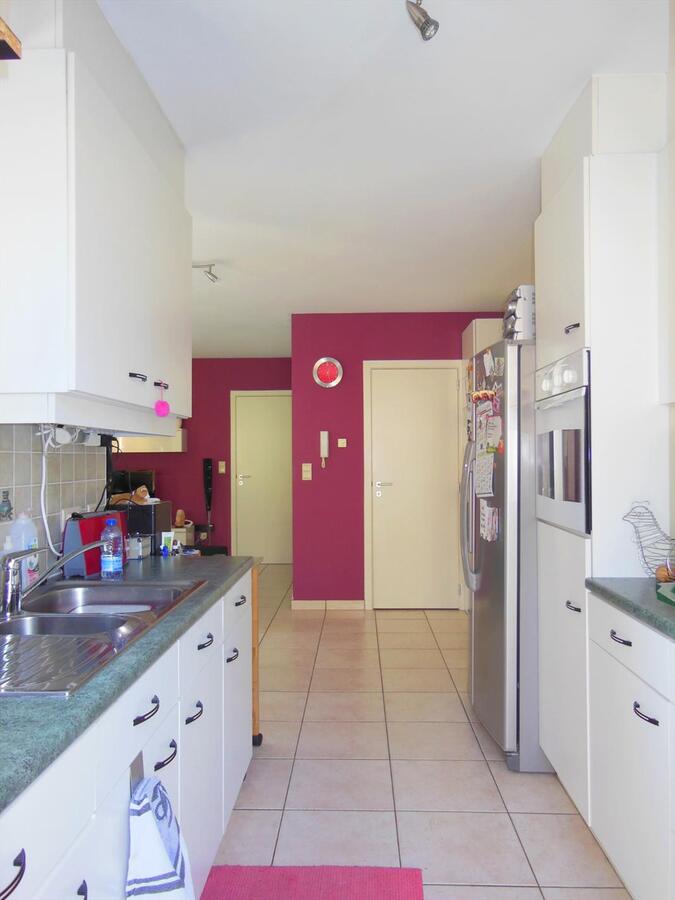 Gezellig gelijkvloersappartement met zonnige tuin en garage 