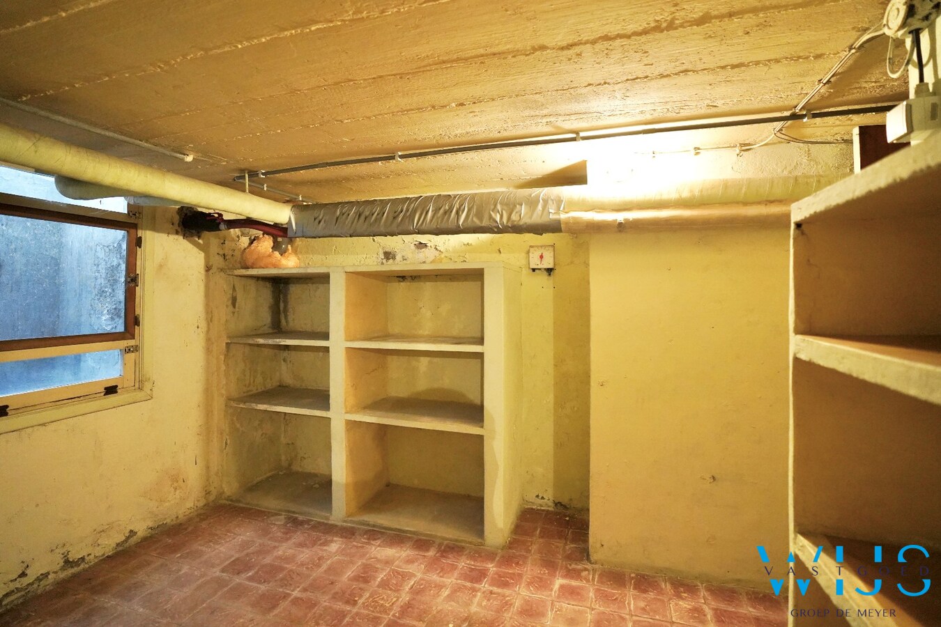 Karaktervolle en instapklare woning met uitzonderlijk perceel van 1.445 m² in hartje Ertvelde 