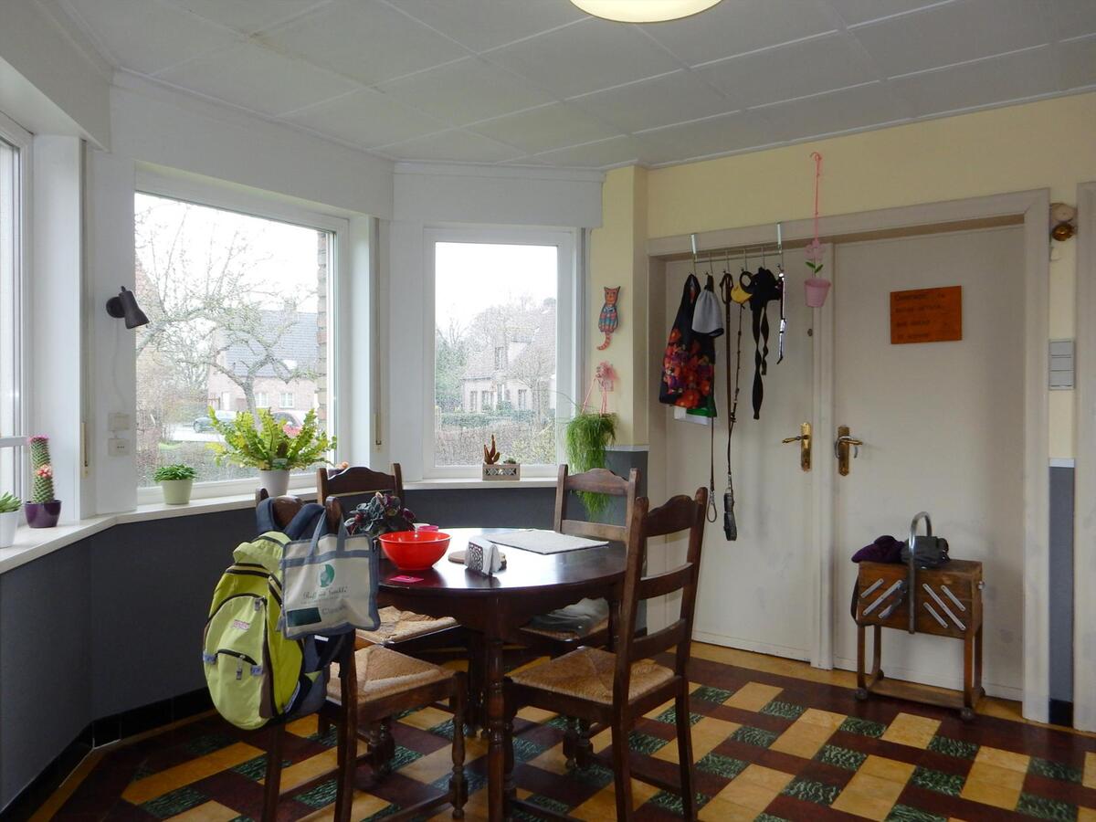 Woning met zonnige tuin en garage 