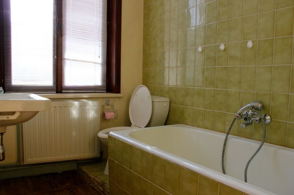 Indrukwekkend herenhuis met verschillende woonmogelijkheden op toplocatie! 