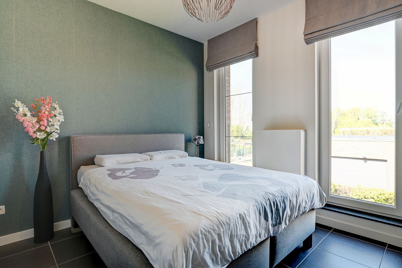 Centraal gelegen appartement met mooi terras en ondergrondse staanplaats 