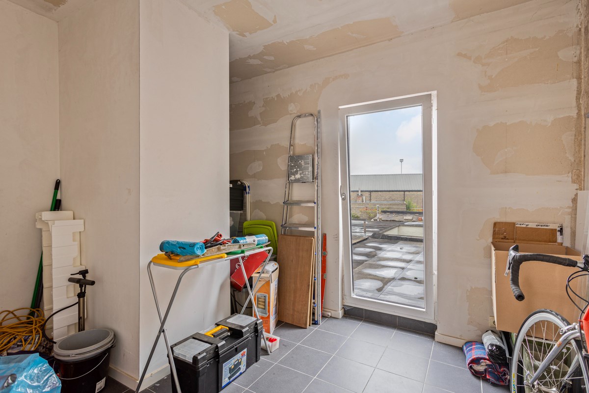 Gelijkvloers appartement met berging. 