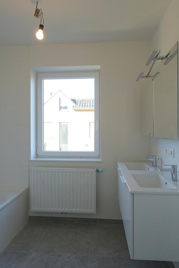 Nieuwbouwappartement met garagebox 